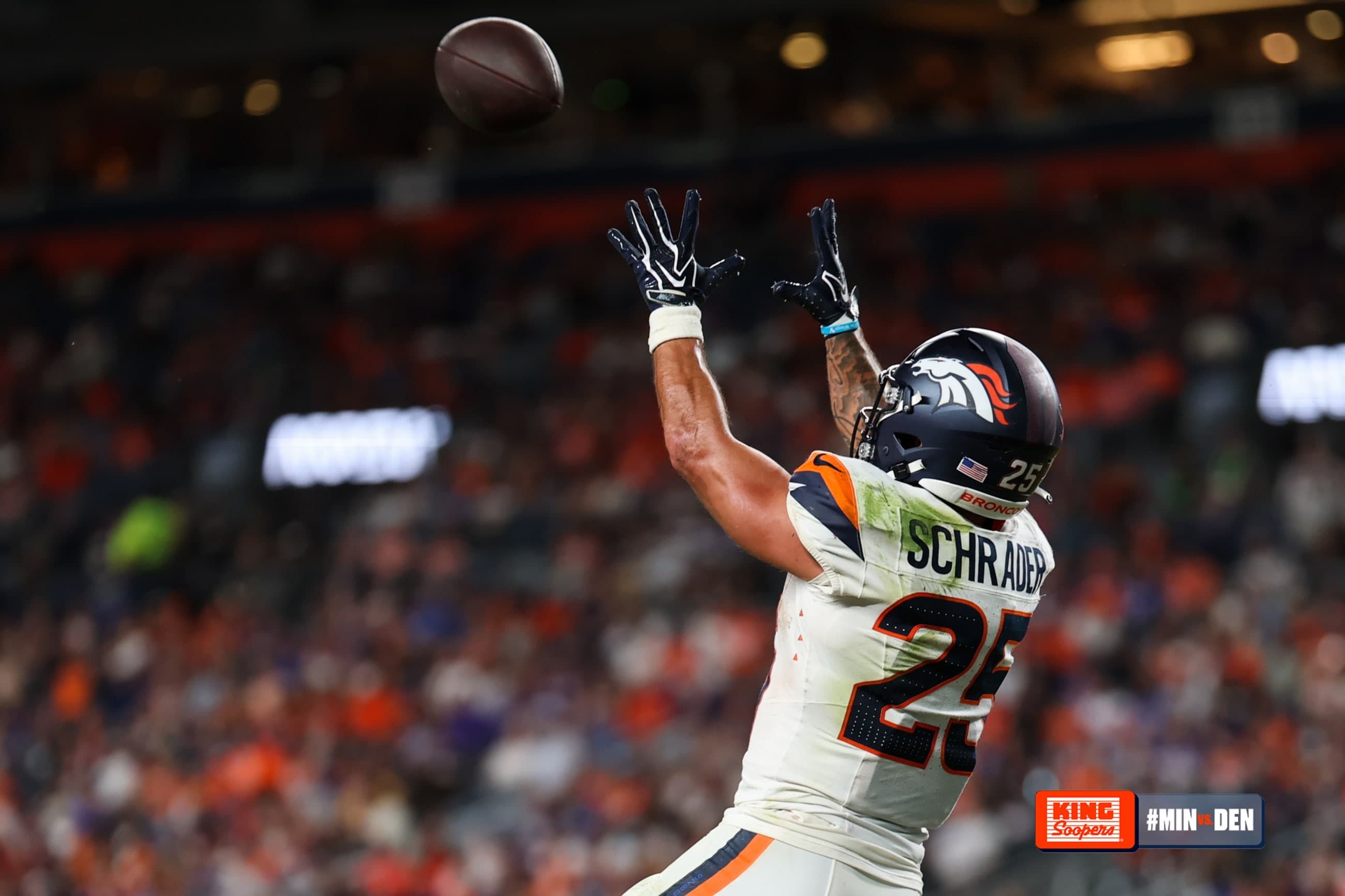 Denver Broncos running back Cody Schrader (25) scores a touchdown during the Broncos' preseason Week 3 game against the Minnesota Vikings at Empower Field at Mile High in Denver, Colorado on August 23, 2026. Photo by Ben Swanson / Denver Broncos